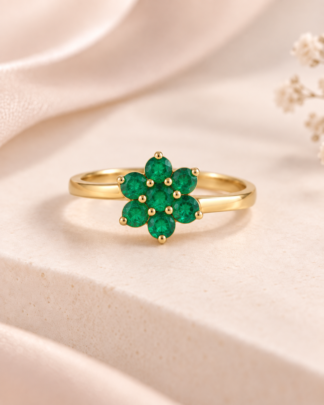 Anillo oro 18k diseño flor con esmeraldas naturales
